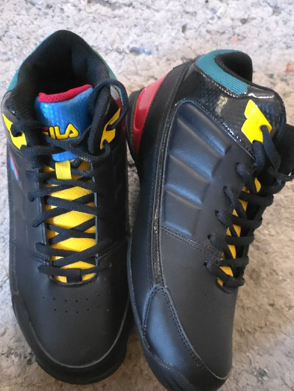 FILA Black High-Top Sneakers with Yellow and Blue Accents